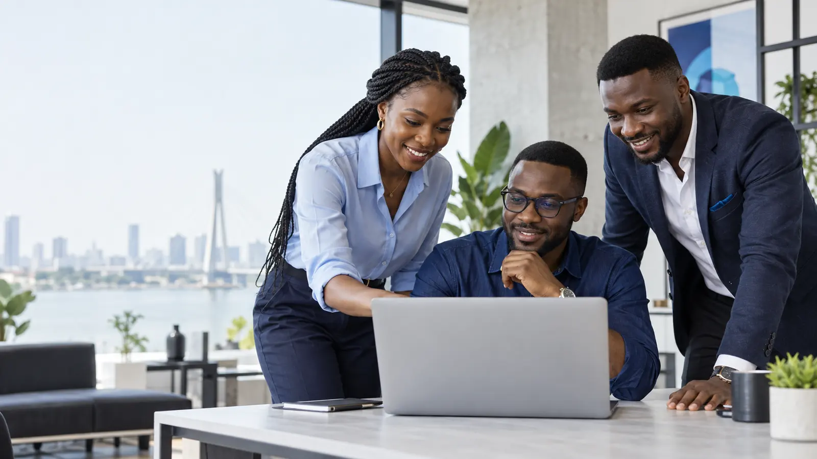 A team collaborating in a bright Lagos workspace